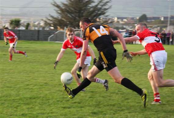 Kieran Donaghy, Austin Stacks, gets away from Tommy Griffinin the 2011 Division 1 Co. League Final against Dingle