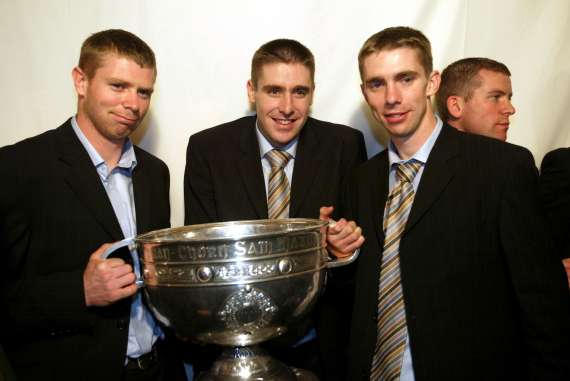 Tomas, Darragh and Marc O Se with Sam Maguire in 2004